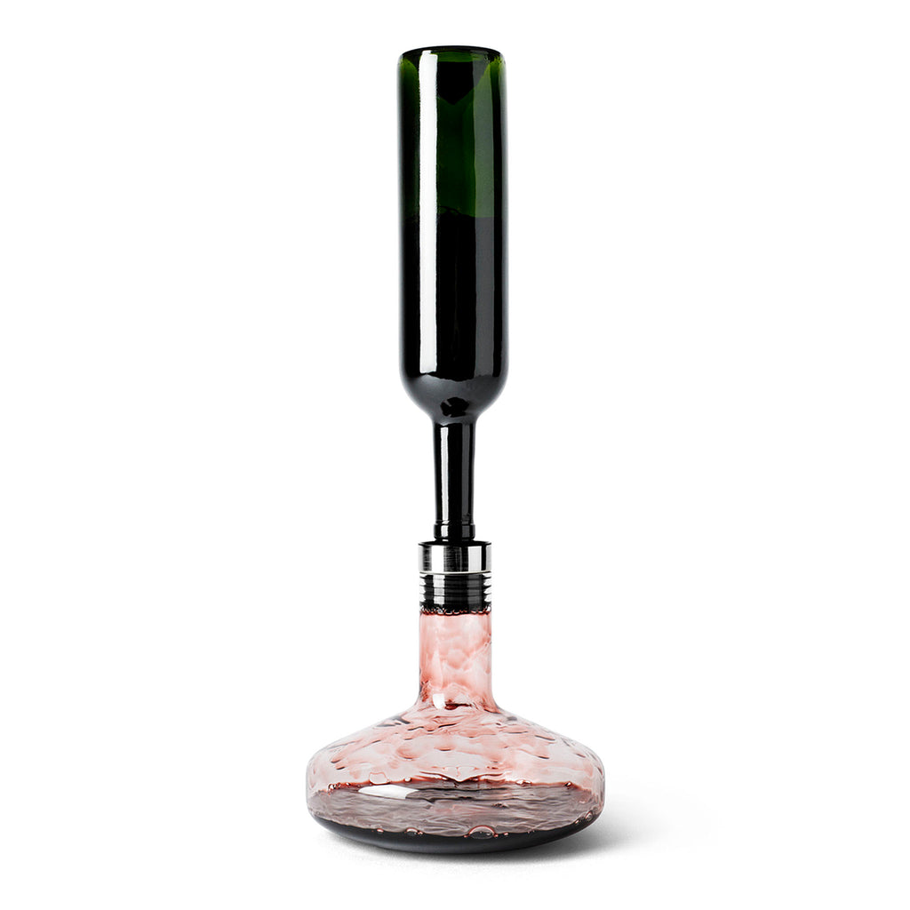 Wine Breather—For those who love a glass of red wine, the Wine Breather is the perfect object. It allows you to both enjoy a glass of wine via easy oxygenation, while also reducing waste by depositing the wine back into the bottle. The new smoked glass colour adds a modern look to the classic lines.
