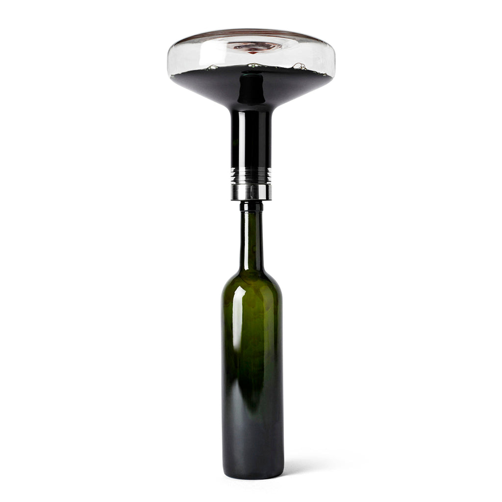 Serve wine in the original bottle.  The New Norm Wine Breather makes it easy to serve aerated, ready to drink wine directly from the original bottle, enabling the bottle to tell its personal story. The secret is found in the unique wine breather invented by wine expert Peter Ørsig.