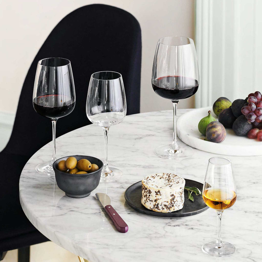 Holmegaard has collaborated for decades with leading Danish glass designers to create a wide variety of wine series based on authentic craftsmanship and modern functionality. One of these is Bouquet, created by Peter Svarrer in 2002, which is now being relaunched in an updated version with a shorter stem.