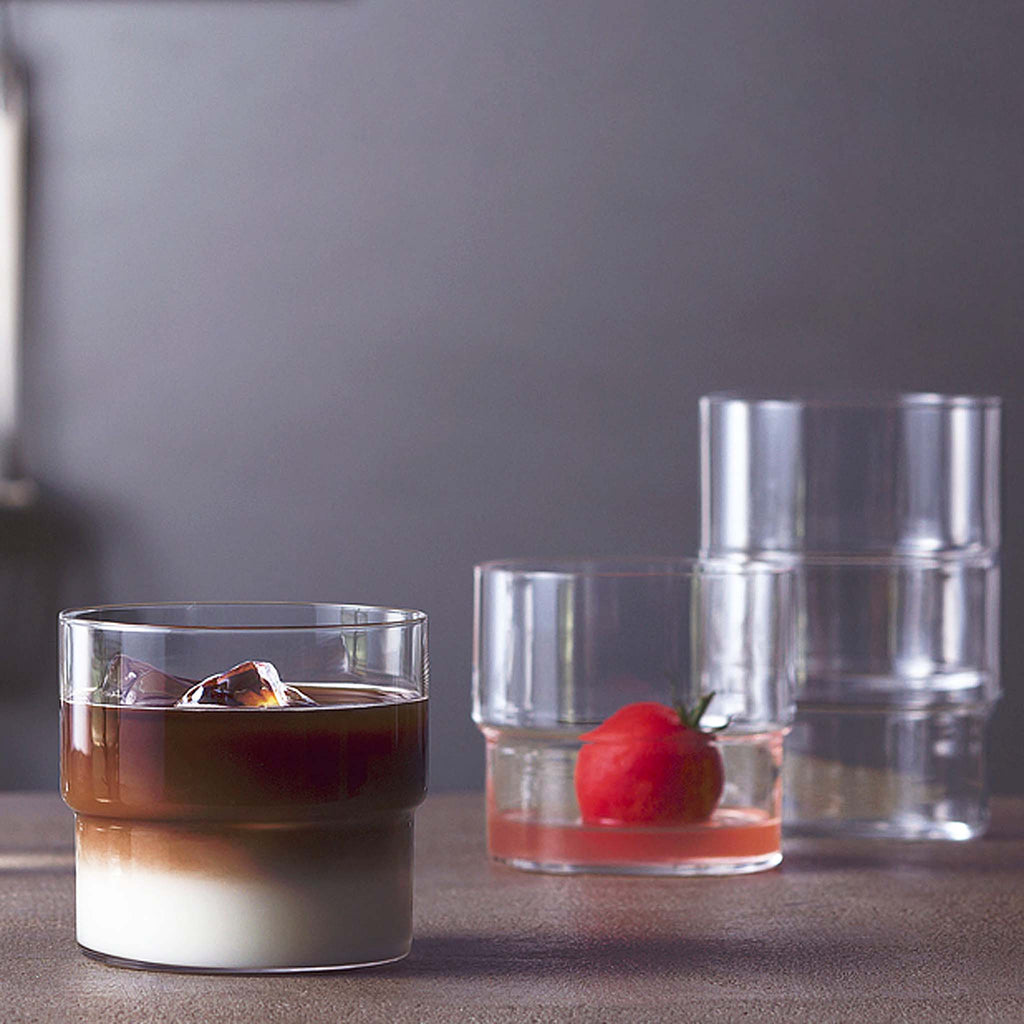 Toyo-Sasaki Glass FINO STACK. The larger but simple mouth design is intended for use of various kinds of drinks in modern diversified dining scenes, allowing users both at home and at restaurants to arrange, pour drinks comfortably and to wash the glass easily.