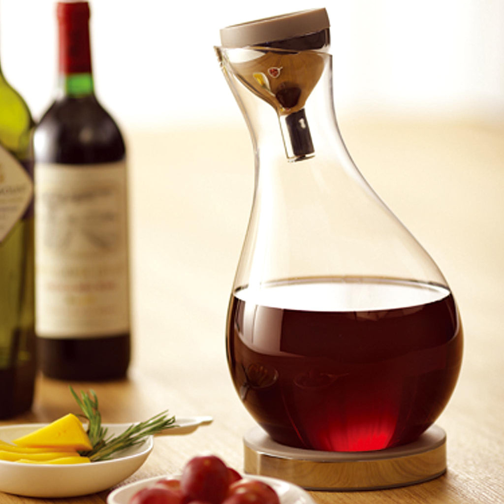 Hulu Wine Decanter by JIA INC. SKU: JHL530. Place the filter on the decanter and pour wine into the decanter. The filter separates sediment and aerates the wine. 