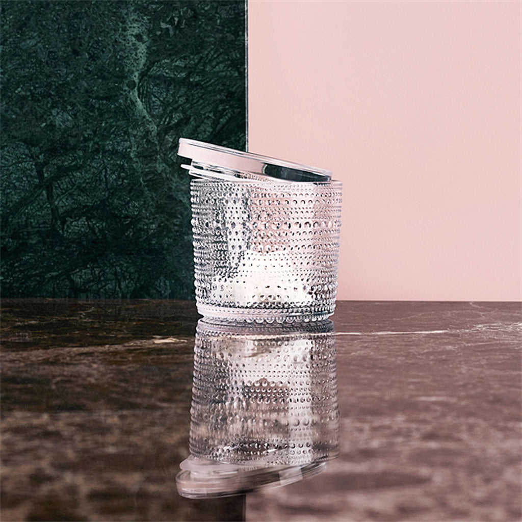 The clear Kastehelmi jar offers playful storage suited for any interior. Perfect for storing small household items, food, spices or to use as a serving dish. Plastic lid. Great gift idea.
