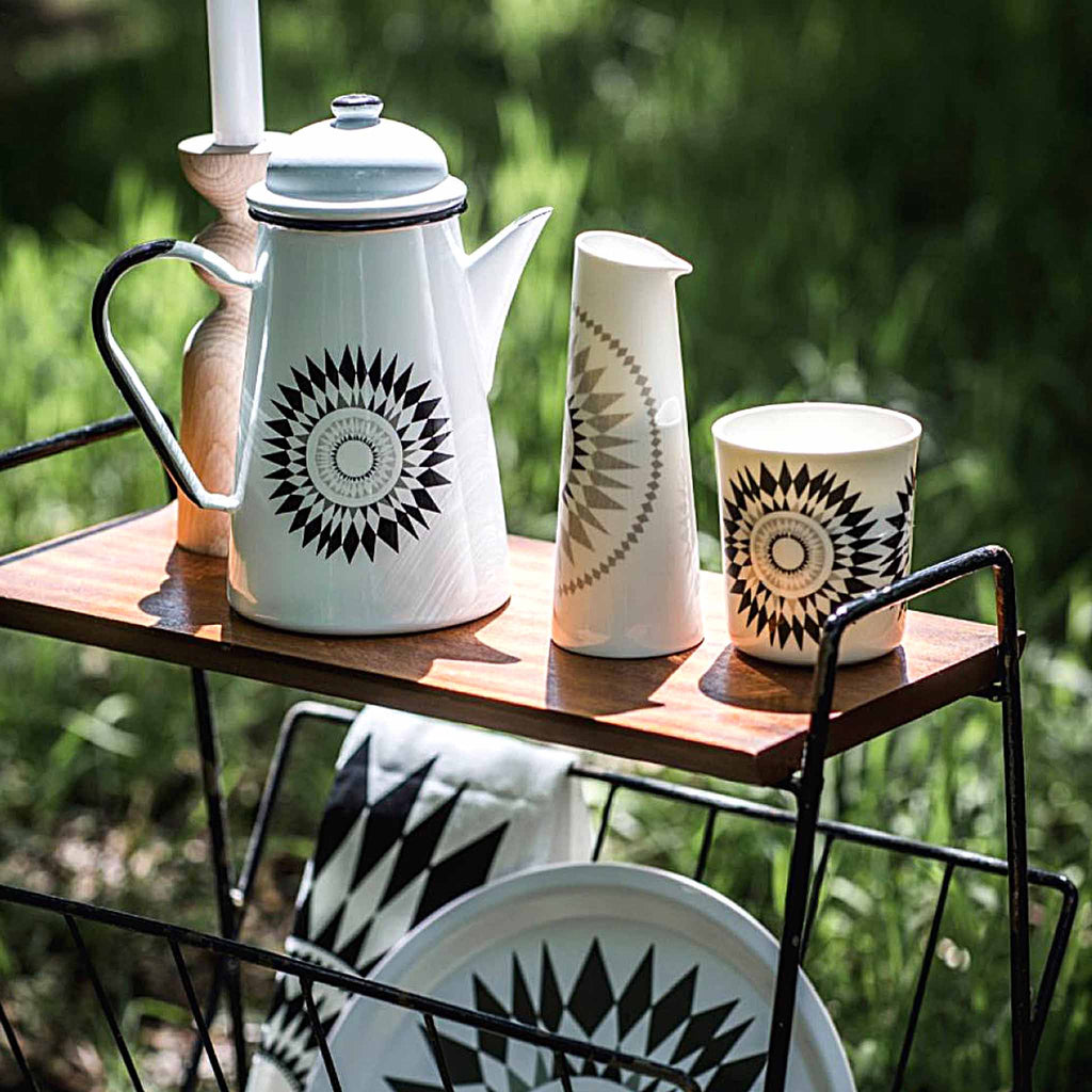 Midnattssol range of products by Sandra Isaksson. Left to right: coffee pot; small jug; and mug.