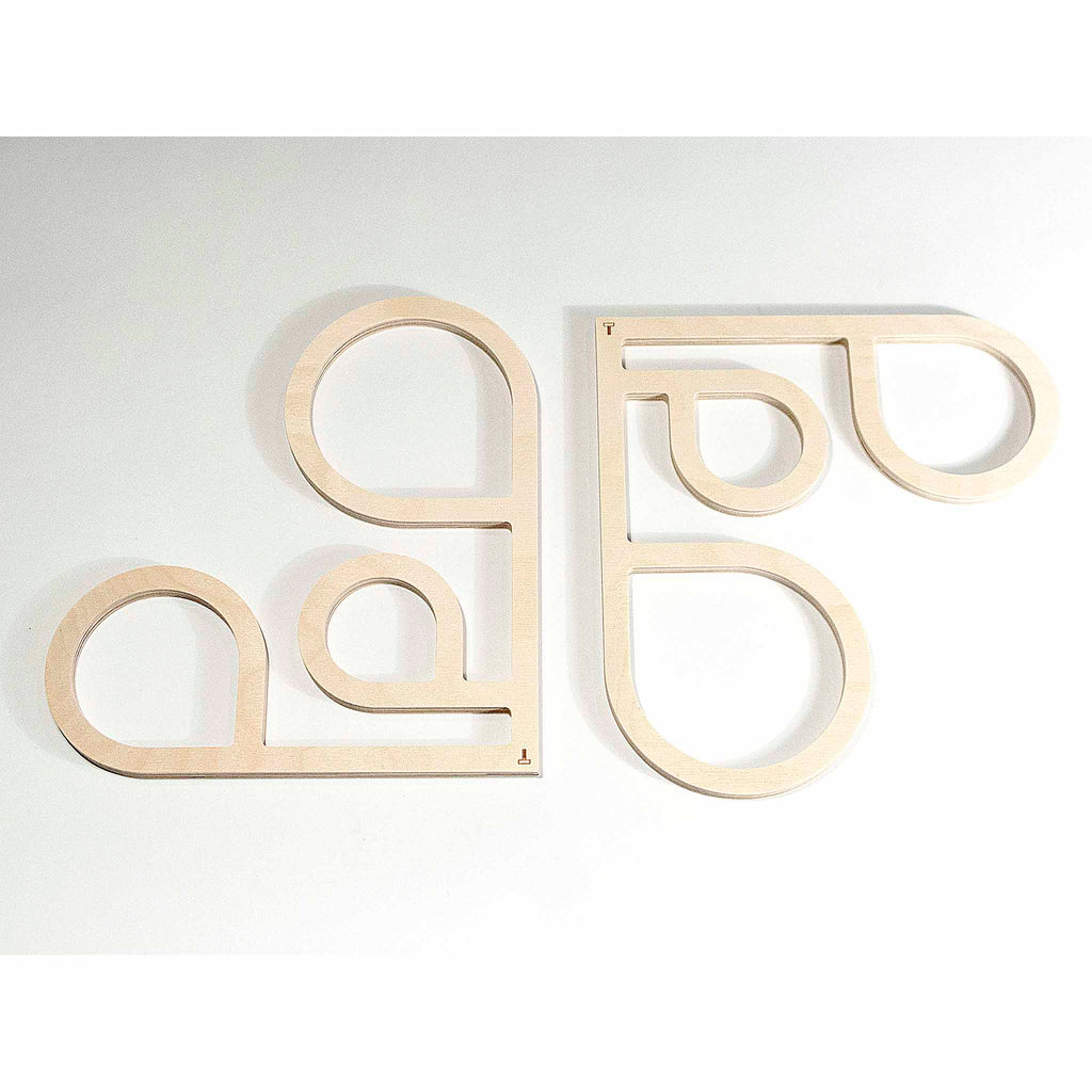 TOMA Objects INSIDE OUT Model G Wood Trivet set by Anne Thomas.