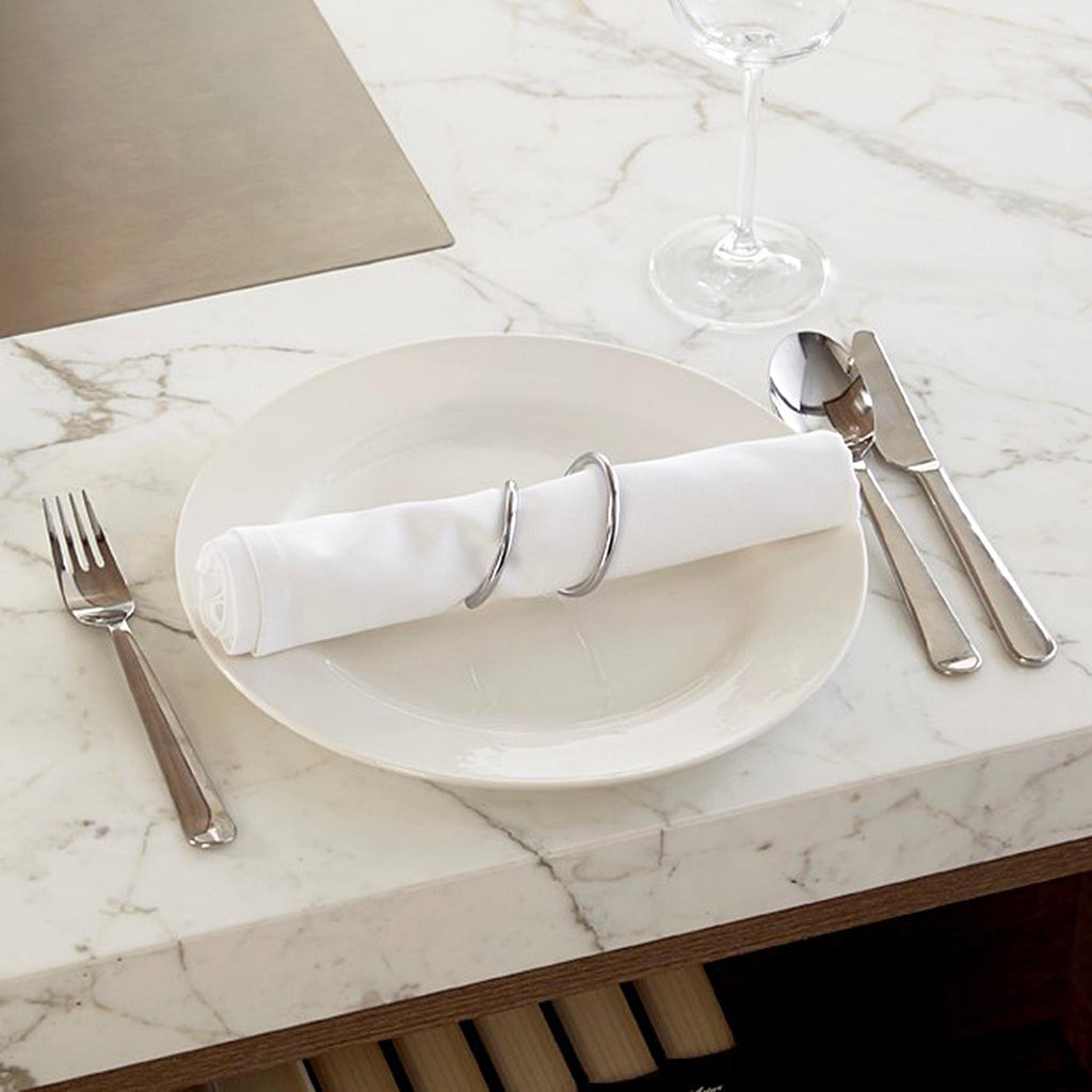 Black + Blum Napkin Loop. Set of 4. Chromed steel. L5.5 x W5.5 x H5.5 cm. L2.2 x W2.2 x H2.2 in. SKU NR001.