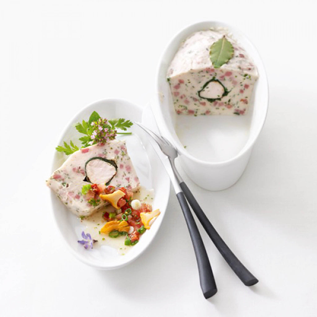 Cutipol Noor Black fork and knife with ASA Selection 250C oval plate and bowl.