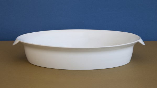 Sowden SoftCooking Oval Roaster. Art. S012. Porcelain ovenware - Oven/serving dish, white. The SOWDEN range of cookware starts from a simple recognition that the process of cooking and the materials used should vary depending on what it is you’re cooking. Boiling potatoes doesn’t require a special pan: stainless steel will do the job. But a slow-cooking coq au vin is best in a high grade, heat resistant ceramic with a hard surface that is non-reactive with food and is easy to clean.