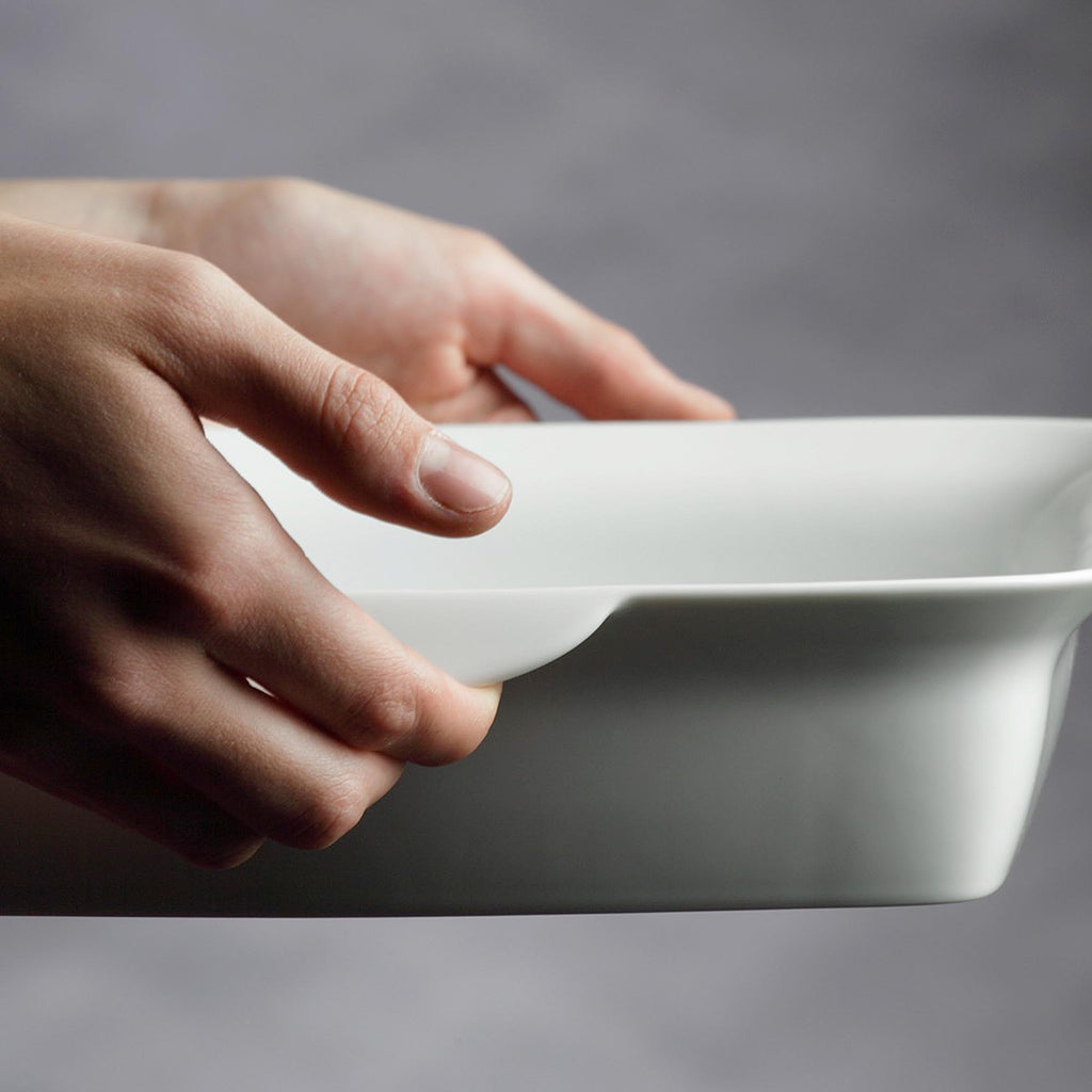  Sowden SoftCooking NATHALIE OVENWARE. The aesthetic combines elegance, practicality and security with the very distinctive downward signature handles helping to safely and firsmly grab the hot dishes out of the oven.