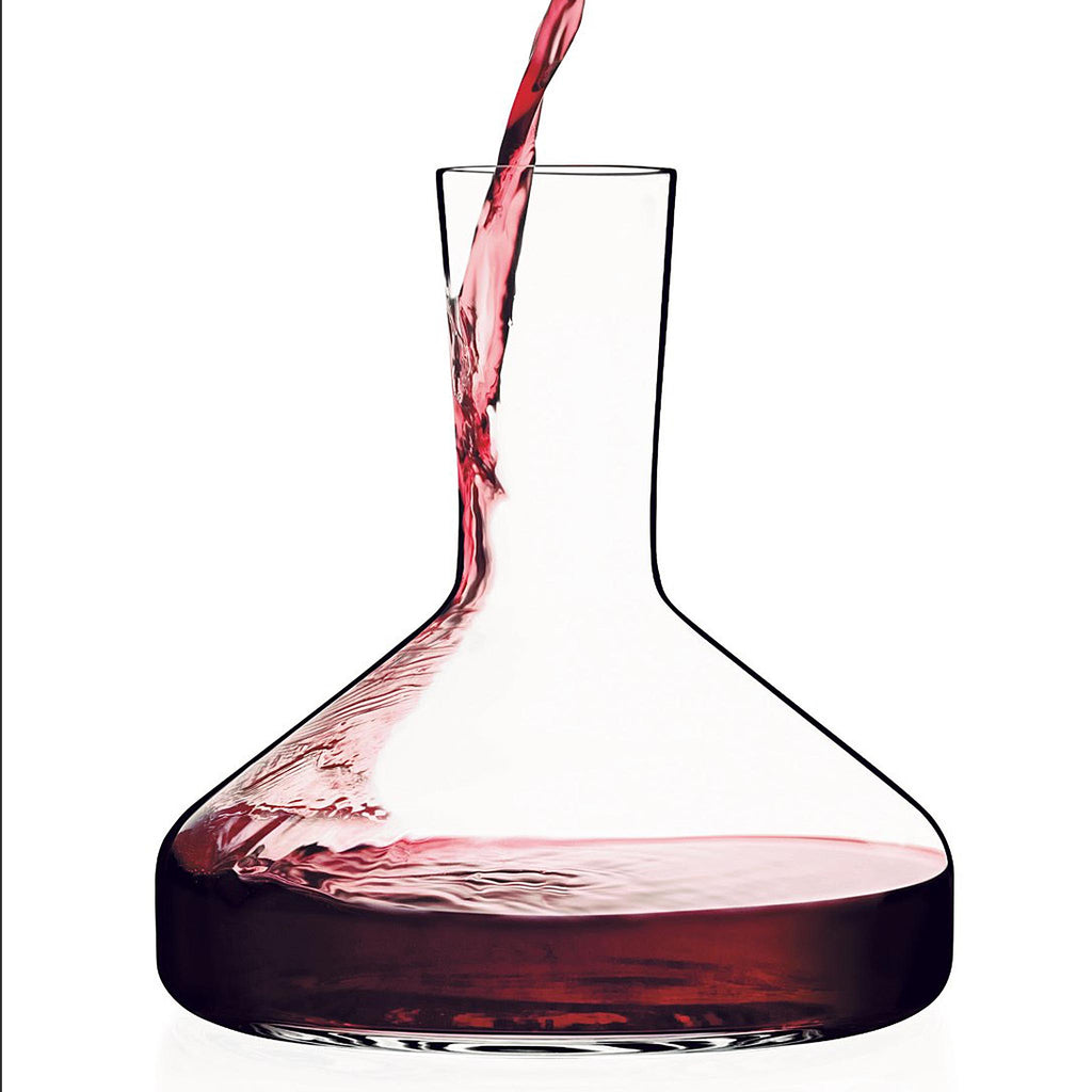 Iittala Decanter. Mouth-blown to perfection, the neck opens slightly to allow just the right amount of air in so wine can breathe. Releasing the flavors locked inside, the Decanter is a perfect match to Iittala’s various wine glasses.