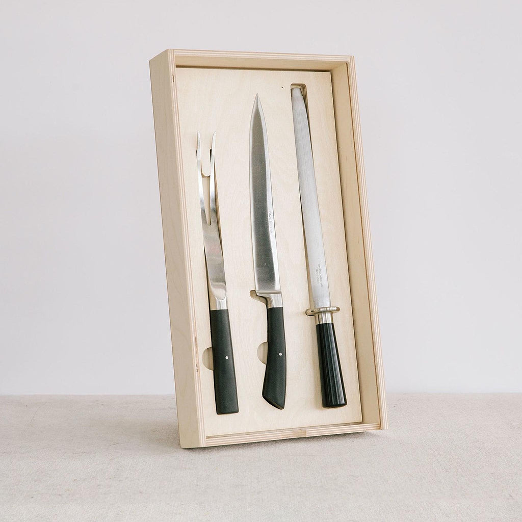 David Mellor Cutlery Black Handle Carving Set by Corin Mellor. Contains:  Carving knife 22.5cm Carving fork 30cm Sharpening steel 37cm. PRODUCT CODE 2515090.