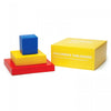 David Mellor porcelain children's tableware 3-piece set. The inner boxes are colour-coded in red, blue and yellow to match the contents. The three smaller boxes are packed in a bright yellow outer box.