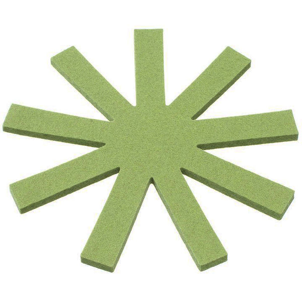 OLKI WOOL FELT TRIVET, ROUND IN GREEN.  OLKI trivets got their inspiration from traditional Finnish Christmas decorations, but they look just as good on the table in the summer too!