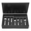 Odeon 44-piece cutlery canteen oak. PRODUCT CODE 4991224. Handmade black stained oak canteen box containing:  6 table knives 6 dessert knives 6 table forks 6 dessert forks 6 soup spoons 6 dessert spoons 6 tea spoons 2 serving spoons. Odeon black handled 44-piece cutlery canteen oak. PRODUCT CODE 4993622. Black acetal resin handle.