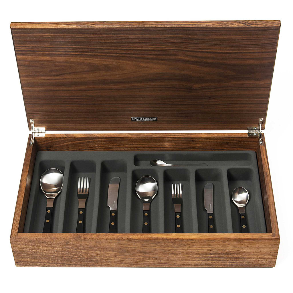 DAVID MELLOR CUTLERY Provençal black 44-piece cutlery canteen walnut. Handmade walnut canteen box containing:  6 table knives 6 dessert knives 6 table forks 6 dessert forks 6 soup spoons 6 dessert spoons 6 tea spoons 2 serving spoons. PRODUCT CODE 4992649.