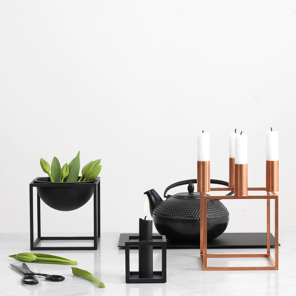 Kubus are available in several variants and sizes, such as Kubus candleholders, flowerpot, bowl, centerpiece and vases. Kubus 4 candleholder was the first iconic design in the collection, and it can create cosiness and warmth to your home. 