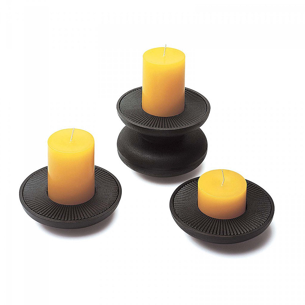 David Mellor's cast iron candleholders were originally designed in 1969, the year when our shop in Sloane Square first opened. We recently located an iron foundry with the traditional skills to make these now classic Swinging Sixties design. The matte black bowls have ridged inserts. Candles supplied separately. 