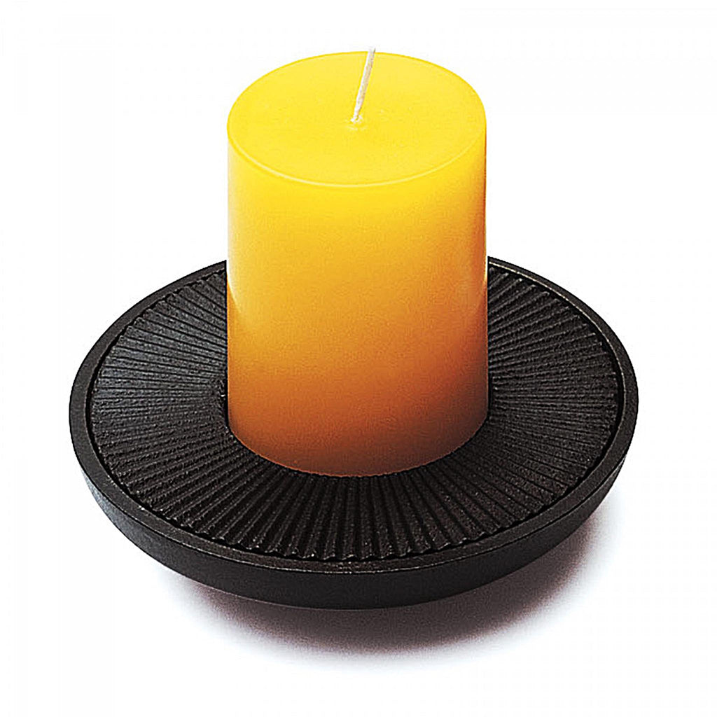David Mellor low cast iron candleholder 4741014. David Mellor's cast iron candleholders were originally designed in 1969, the year when our shop in Sloane Square first opened.