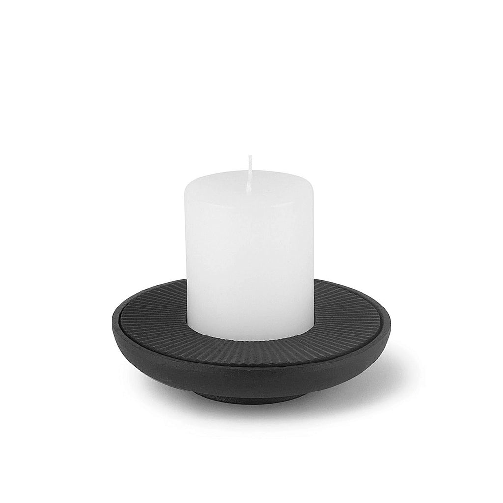 David Mellor low cast iron candleholder 4741014. David Mellor's cast iron candleholders were originally designed in 1969, the year when our shop in Sloane Square first opened.