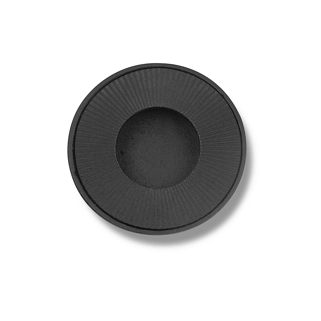 David Mellor low cast iron candleholder. The matt black bowls have ridged inserts. This low candleholder is supplied in a gift box.