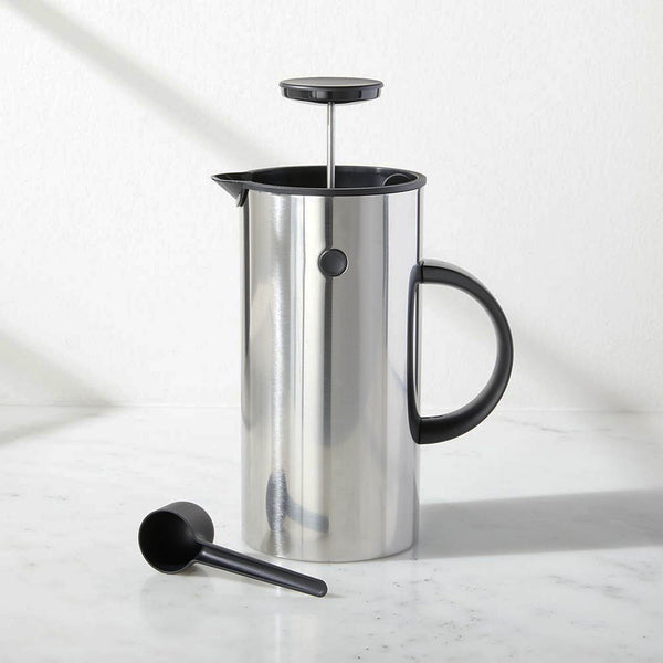 Stelton EM77 French Press 1L stainless steel by Erik Magnussen. Art. no. 810. UPC: 5709846010802. In the same simple idiom as EM77 vacuum jug, the EM press coffee maker holds eight cups, and its double walls keeps the coffee warm for longer. Turn the lid to pour the coffee and turn it again to close. Doubled walled press coffee maker keeps the coffee hot for a longer time.