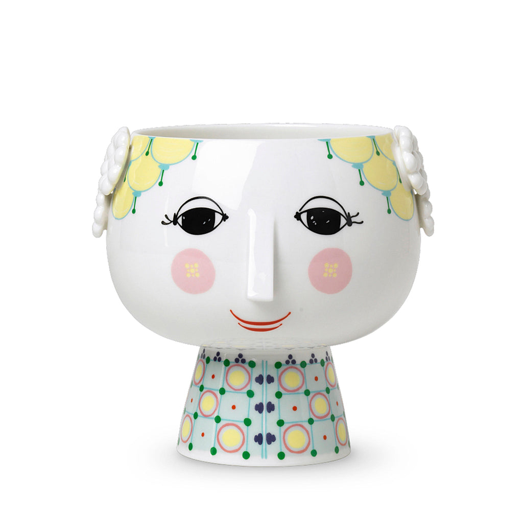 Bjørn Wiinblad Eva Flowerpot. Art. No. 56512. Height: 5.7" Diameter: 6.1" Note: Dish-washer safe. This version of Bjørn Wiinblad's famous plant pot depicts Eva on a beautifully decorated base. 