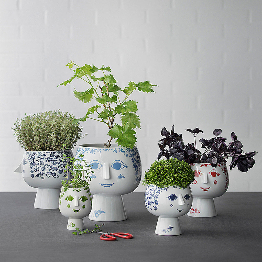 The Juliane flowerpot plant holders feature colorful motifs of well-known Bjørn Wiinblad feminine forms. 