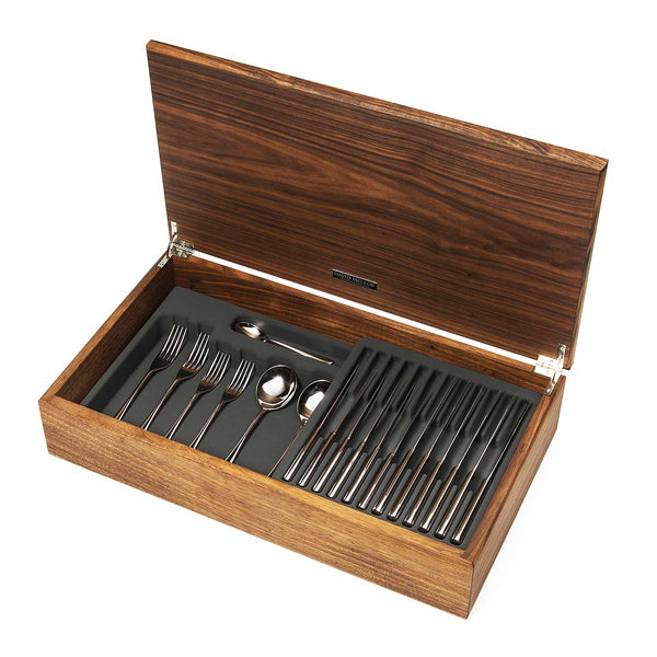 Handmade walnut canteen box containing:

8 table knives
8 dessert knives
8 table forks
8 dessert forks
8 soup spoons
8 dessert spoons
8 tea spoons
2 serving spoons